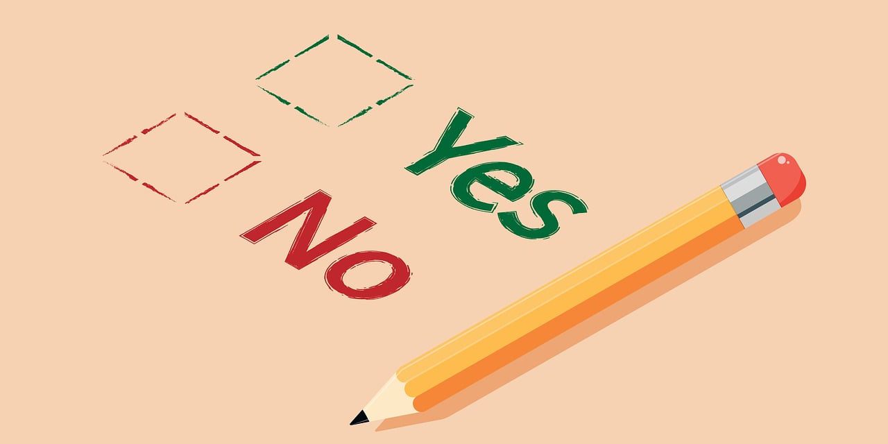 picture showing pencil with yes and no tick boxes